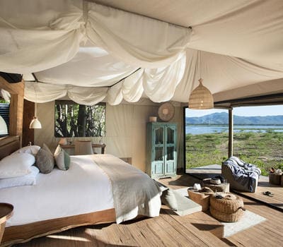 Looking out from your bedroom towards the water and wildlife at Nyamatusi